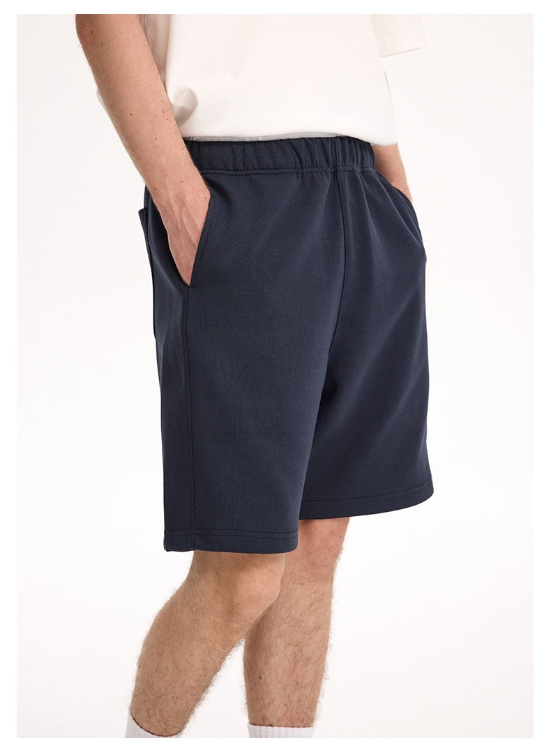 Navy lounge shorts, side view with pocket